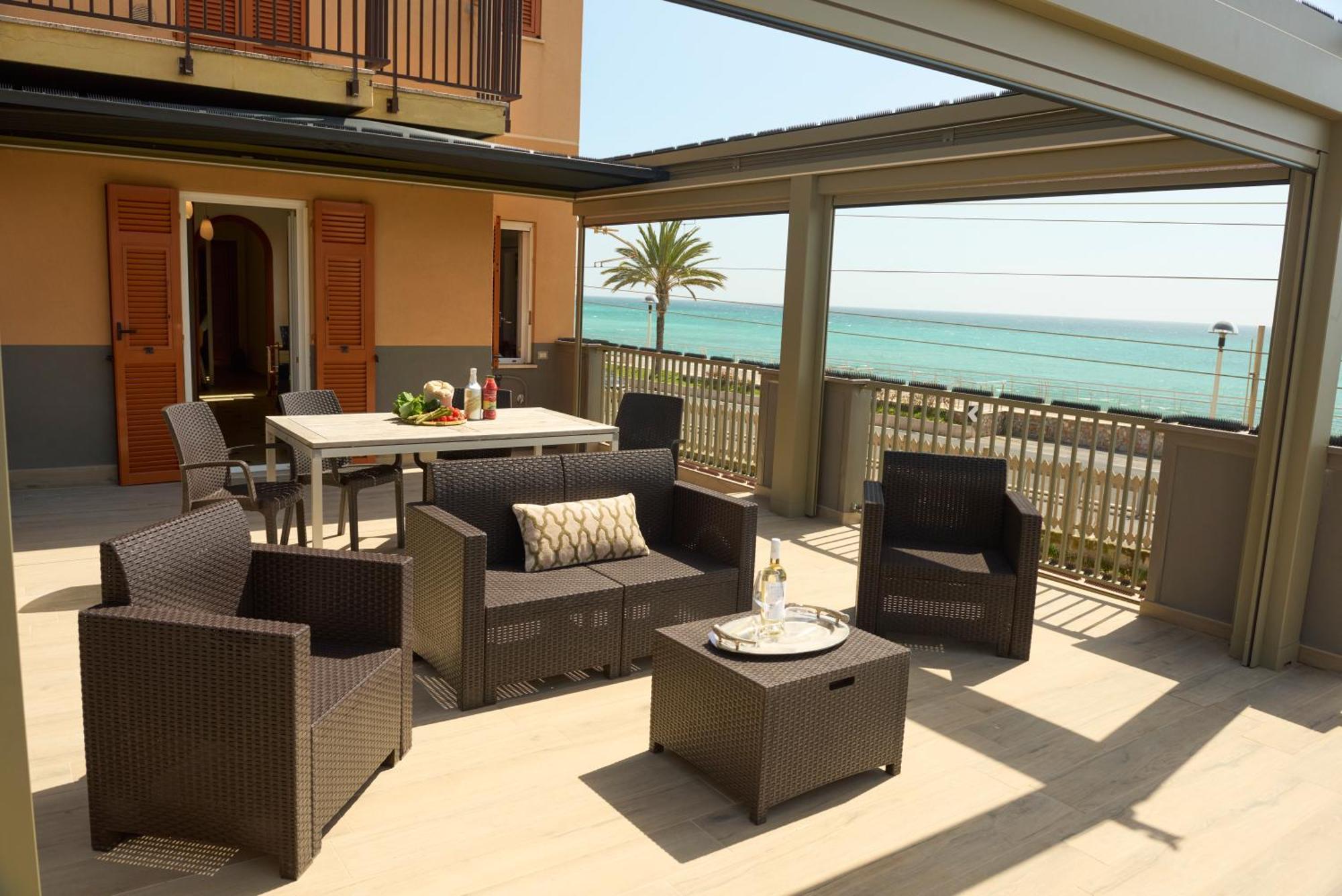 Апартаменты Terrazza Sul Mare A Пьетра-Лигуре Экстерьер фото